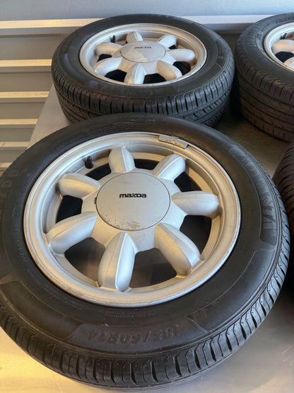 OEM Enkei Daisy Wheel Set w/ Center Caps & Tires – 1990–1997 Mazda Miata NA