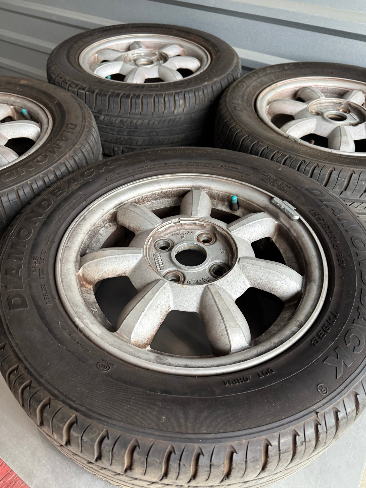 OEM Daisy Wheel & Tire Set (4) – 1990–1997 Mazda Miata NA